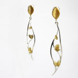 Hanging leaf earrings in gold and silver