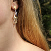 Hanging leaf earrings in gold and silver