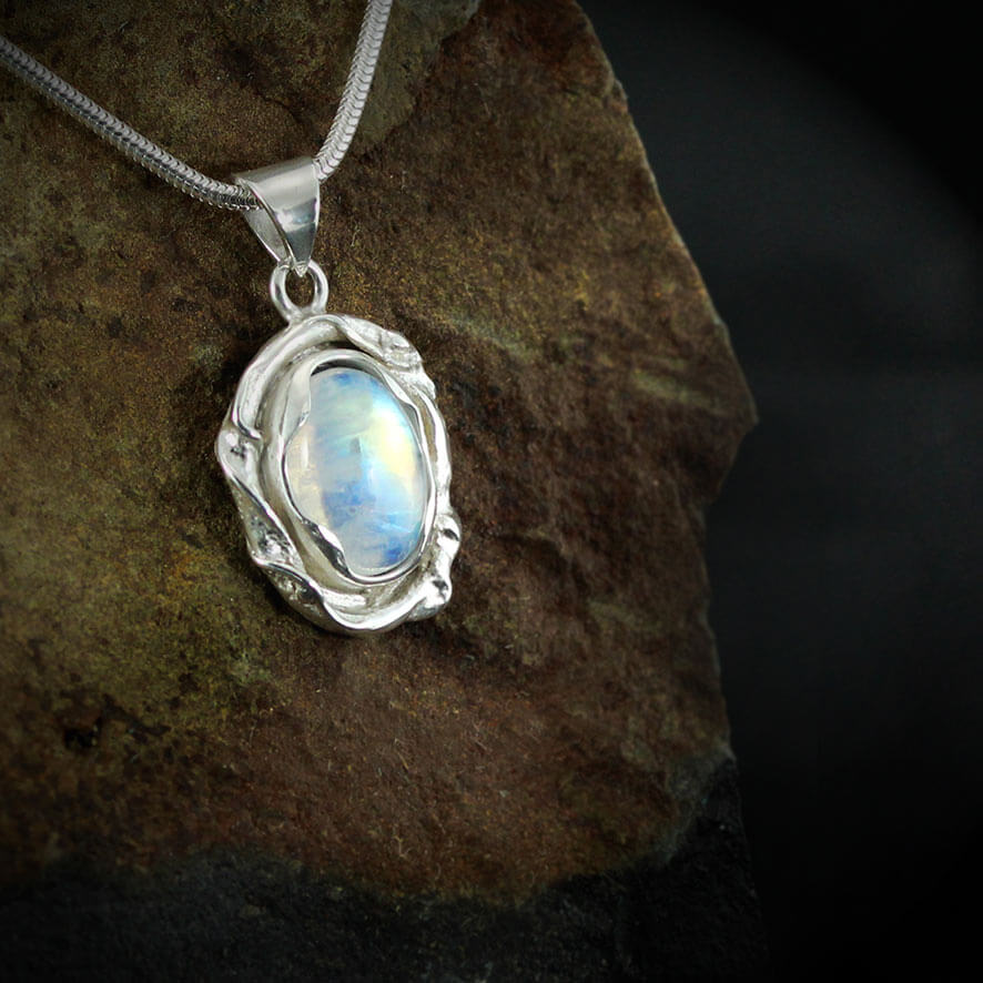 Melted Silver with a beautiful Labradorite Gem