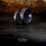 Rough black wedding rings
