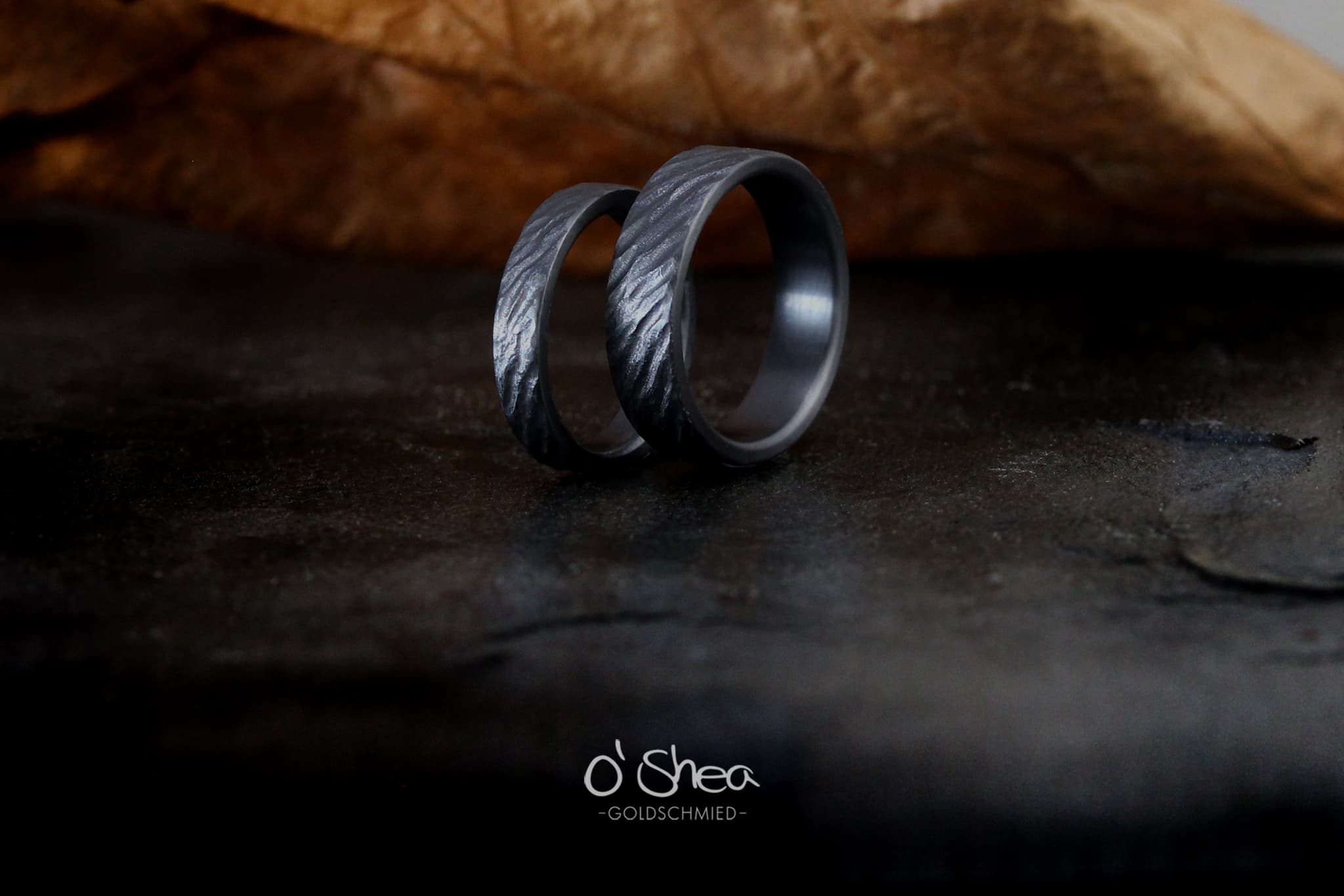 Rough black wedding rings