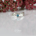 White gold engagement ring with a blue stone. Aquamarine. 