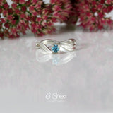 White gold engagement ring with a blue stone. Aquamarine. 