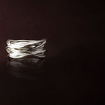 Silver ring: -  made of twisted silver roots