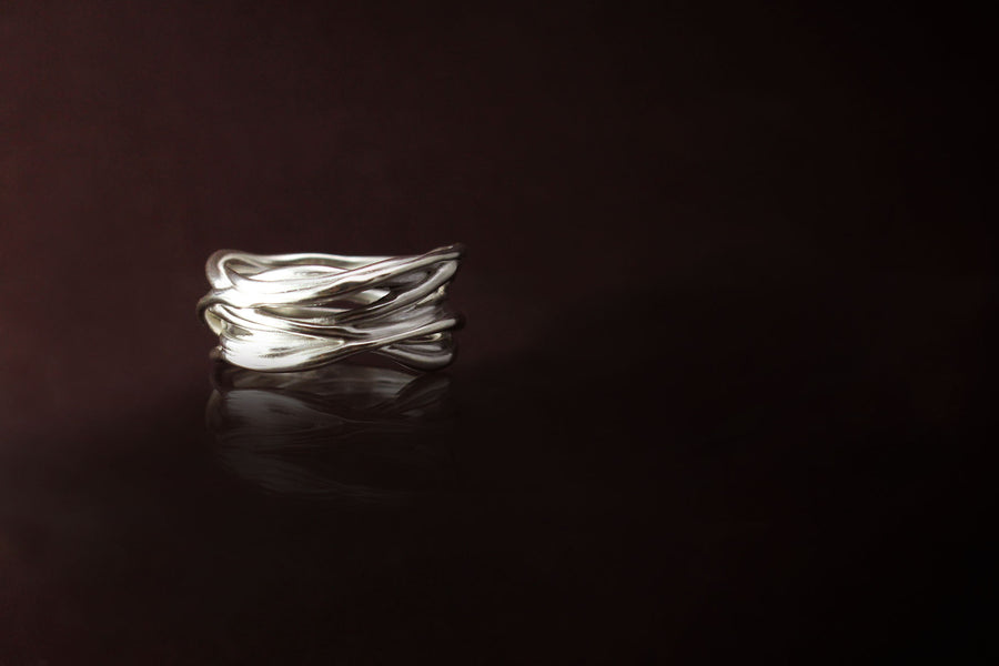 Silver ring: -  made of twisted silver roots
