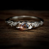 Engagement ring:  In love and melted together. This one is perfect...
