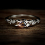 Engagement ring:  In love and melted together. This one is perfect...