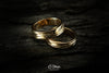 Wedding Rings: engraved lines represent the flow through love and life