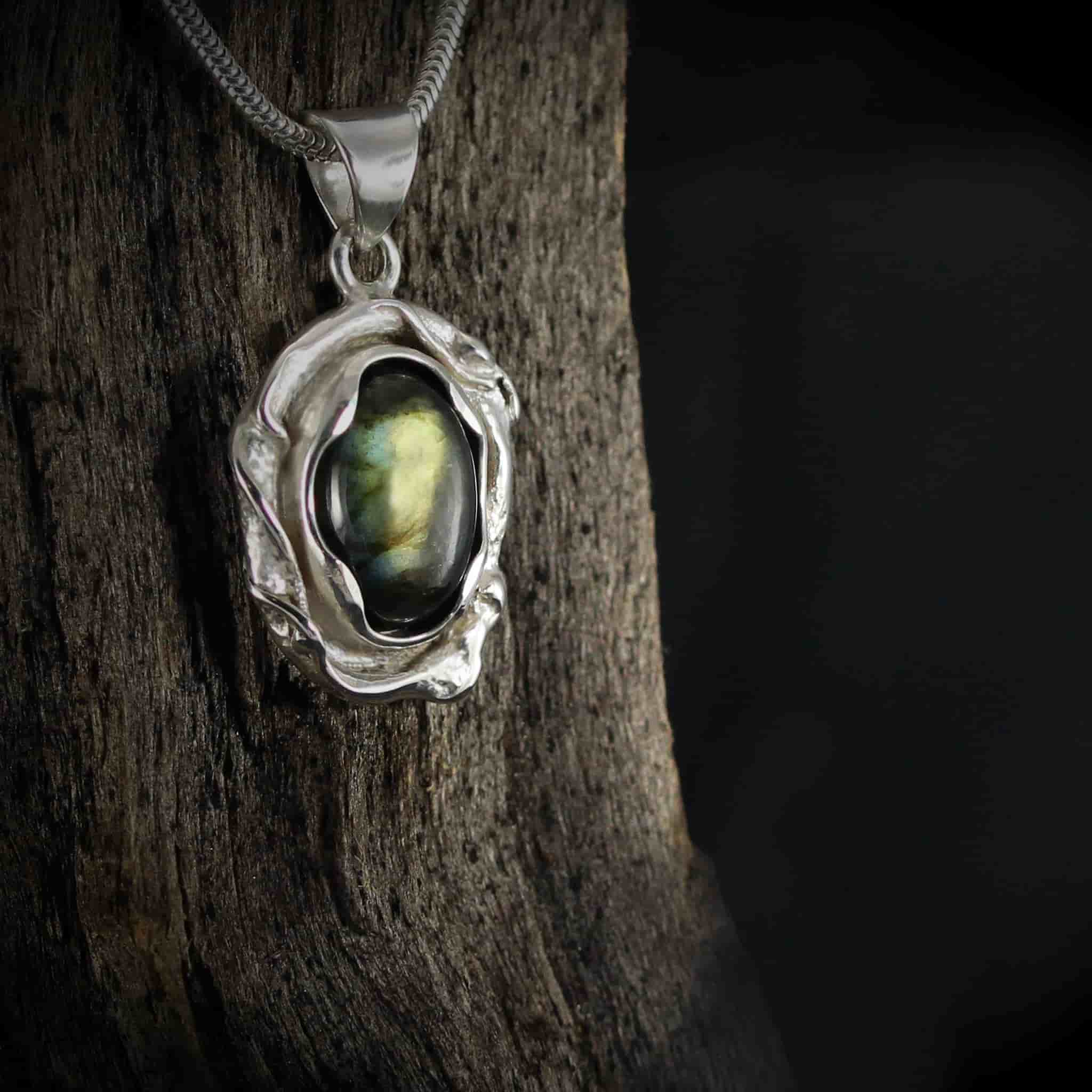 Melted Silver with a beautiful Labradorite Gem