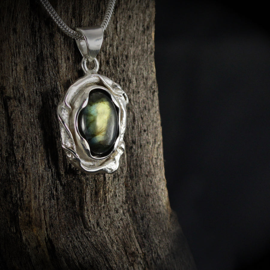 Melted Silver with a beautiful Labradorite Gem