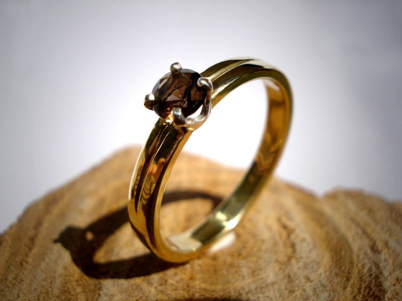 Engagement Ring: - Smokey, Stream line, unique and very comfortable...